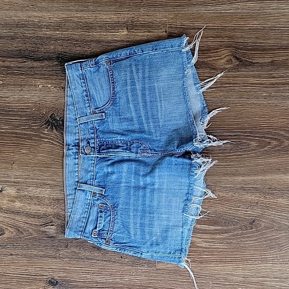 Levi's Light Blue Frayed Denim Cutoff Shorts
